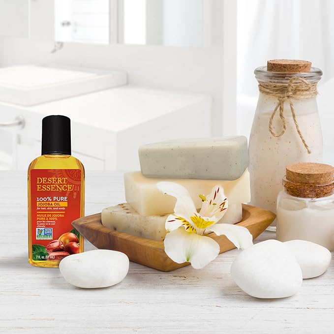 Desert Essence 100% Pure Jojoba Oil – 2 Fl Oz Moisturizer for Hair, Skin & Scalp | Makeup Remover & Aftershave Hydrator, Non-GMO, Vegan, Cold-Pressed, Anti-Flakiness & Non-Clogging Beauty Elixir