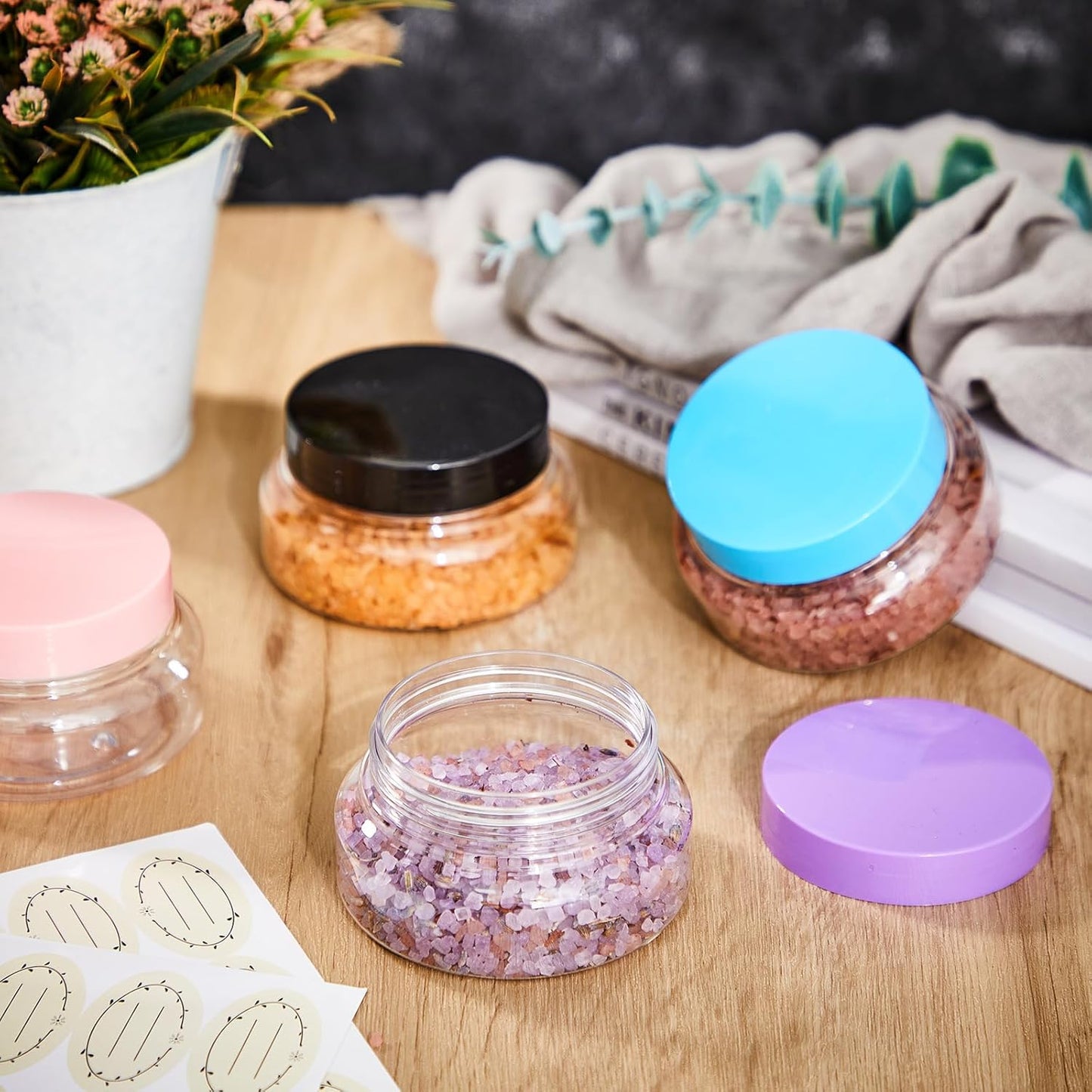 Tessco 24 Pack Plastic Jars with Lids Labels Empty Clear Plastic Jars Round Refillable Cosmetic Containers Body Butter Containers Bulk Sugar Scrub Bottle for Make Up(5 oz,Multicolor)